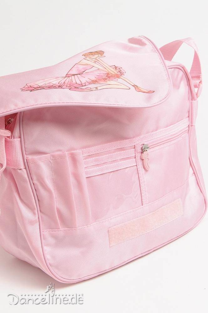 Die Bloch Balletttasche Bloch A322 Schultertasche ist eine rosa Umhängetasche mit mehreren Reißverschlussfächern und einer Abbildung eines Ballett-Mädchens in einem Tutu auf der Klappe. Die Tasche ist aus strapazierfähigem Stoff gefertigt und verfügt über einen verstellbaren Schulterriemen zum Tragen. Das Logo „Dancelinede“ ist in der unteren linken Ecke sichtbar.