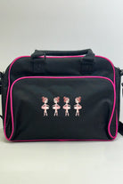 Die Danceline Kinder Balletttasche ist eine schwarze Umhängetasche mit rosa Paspelierung und einem gestickten Design von vier Ballerinas in rosa Kleidern auf der Vordertasche.